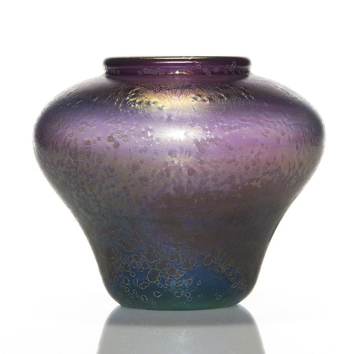 Early Mark Peiser vase, bronzy metallic, 4 3/4”, 1970: Early Mark Peiser vase, produced in 1970, shading from amethyst into turquoise blue. The surface is treated with an acidic spray creating a metallic bronzy look with two large patches, one one either