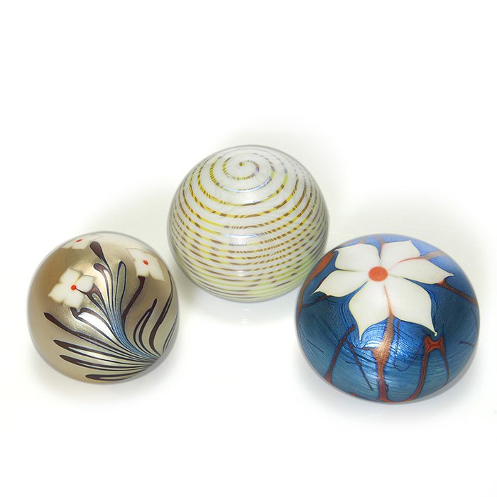 3 Stephen Smyers Northern Star paperweights, 1976: Three early paperweights by Stephen Smyers of Northern Star Glass. 1) 2 1/4 inch a helical coil over King Tut design in chartreuse and white. Signed “Northern Star, 76, F49, S. Smyers”. 2) 2 inch 