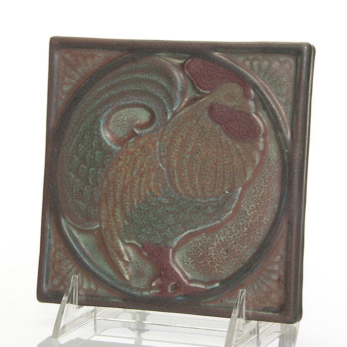 Rookwood Ombroso “Rooster” tile, 1913, 5 5/8”: Early tea tile featuring a rooster, a design by William Hentschel, pressed in 1913 and covered with Rookwood’s Ombroso glaze. Impressed on the bottom with the Rookwood logo, date and shape 2044. In 