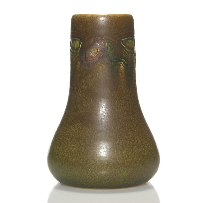 Rookwood Ombroso vase, Todd, 1914, 1132, 7 7/8”: Rookwood vase with carved floral decoration covered in the Ombroso glaze, the work of Charles Todd in 1914. Marks include the Rookwood logo, date, shape 1132 and Mr. Todd’s incised initials. There i