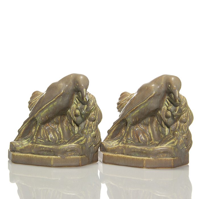 Rookwood mat “Rook” bookends, 1934, 2275, 5 1/8”: Nice set of Rookwood “Rook” bookends done in a brown over green over reddish yellow mat glaze in 1934. The glaze is crystalline and striated, leaving some interesting passages on the rooks and the