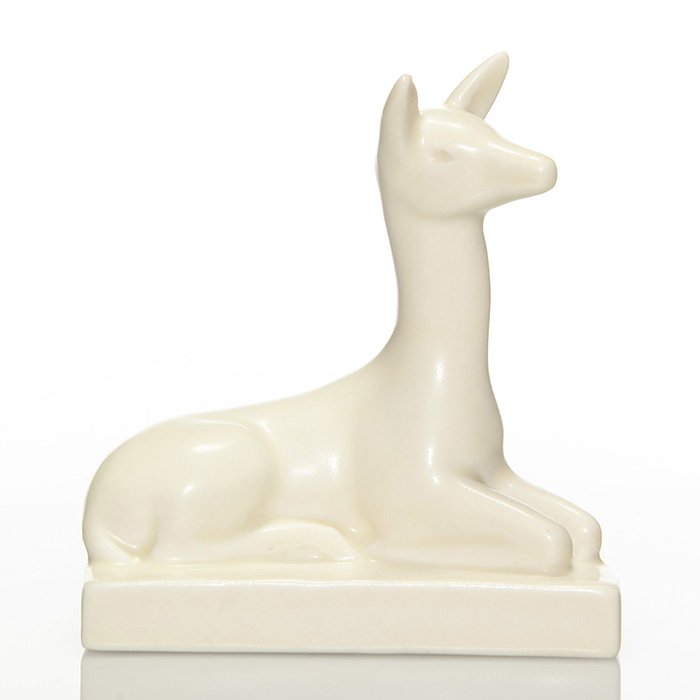Rookwood gazelle paperweight, 1936, 6156, 4 1/4”: Gazelle paperweight, a Louise Abel design, cast in 1936 and covered with the Ivory Mat glaze. Marks include the Rookwood logo, date, shape 6156 and Ms. Abel’s mold monogram. Height is 4 1/4 inches.
