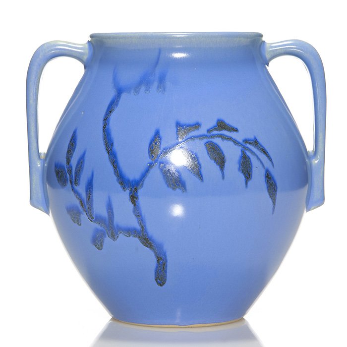 Hand decorated Roseville vase, Earlam shape, 7”: Hand decorated Roseville vase, an Earlam shape, 519-7. Blue-black slip of stems and flowers on a medium blue ground. Trial glaze notations of the bottom. Height 7 inches. Excellent original condition.