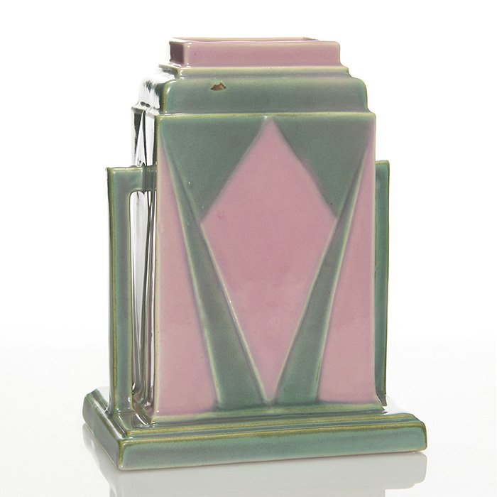 Roseville Futura “Jukebox” vase, 386-8”, 8 1/8”: Roseville Futura “Jukebox” vase, shape 386-8”. Unmarked. There is faint crazing and a small dark spot in the green glaze near the top. Height is 8 1/8 inches.