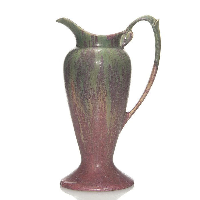 Roseville Carnelian II ewer, 12”, red, shape 1313: Carnelian II ewer, shape 1313 with green, lilac and tan flowing over a mottled red glaze. Height 12 inches. Excellent original condition.