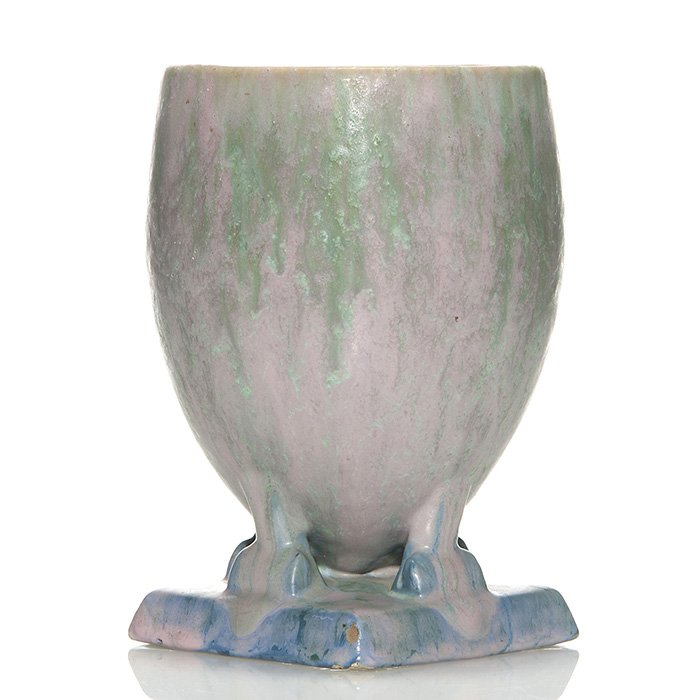 Roseville Futura “Ostrich Egg” vase, 400-7”, 7 1/2”: Roseville Futura “Ostrich Egg” vase, shape 400-7”, done in pink, blue and green Carnelian II glazes. Unmarked. Height is 7 1/2 inches. There are glaze chips to two corners of the plinth and ther