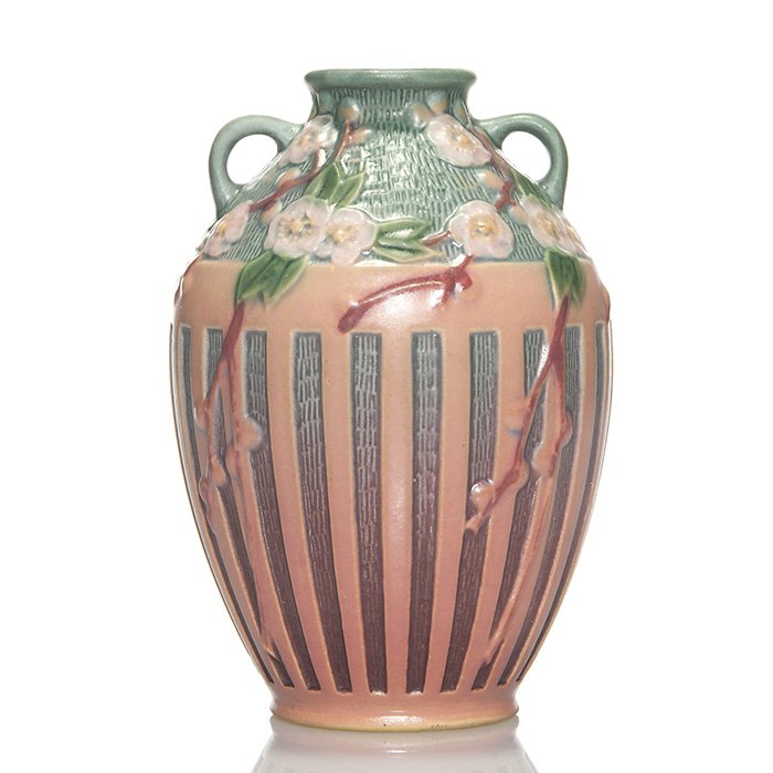 Roseville Cherry Blossom vase, 7 1/4”, shape 622: Cherry Blossom vase, 7 1/4 inches with a turquoise and coral glaze. Marked as shape 622 in red crayon beneath. Nice crisp mold and good glaze, tho slightly crazed on the pink basket. Otherwise, excell