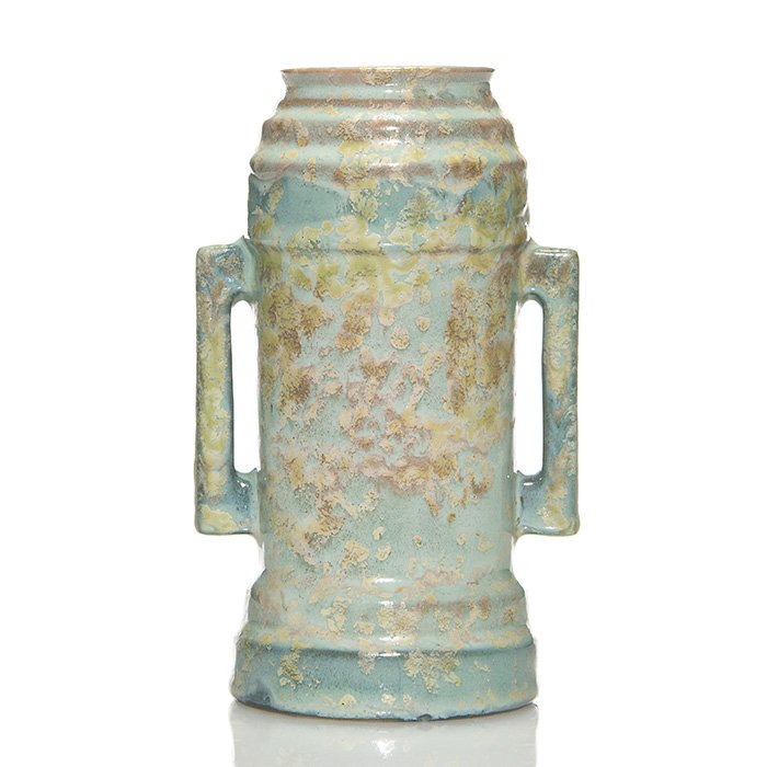 Roseville Futura “Beer Mug” vase, shape 381-6”: Roseville Futura “Beer Mug” vase, shape 381-6”, done in teal and gold Carnelian II glazes with great crystals. Unmarked but having an original Roseville Pottery label on the bottom. Height is 6 