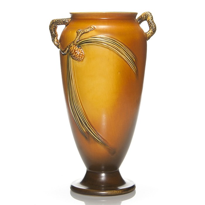 Roseville Pine Cone vase in brown, shape 840-14”: Large Roseville Pine Cone vase, shape 850-14, in brown. Impressed with the Roseville logo and the shape number. Good mold, glaze and color with light crazing. Height is 14 3/4 inches.