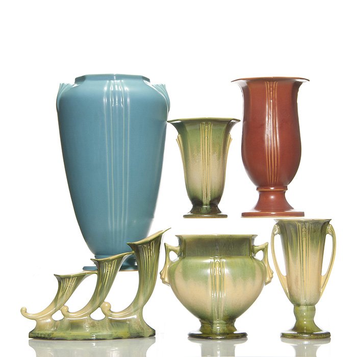 6 Russco pieces, 4 crystalline, 1 Blue, 1 rust, 14 3/8”: Six Roseville Russco pieces, 4 with a wonderful green crystalline glaze, one large vase in solid blue and another vase in rust, the tallest of which is 14 3/8 inches. All are in excellent original con