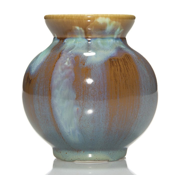 Rookwood glaze effect vase, 1932, 6303, 4”: Glaze Effect vase produced in 1932 by dripping turquoise over a light brown ground. Marks include the Rookwood logo, date, shape 6303 and a cross shaped esoteric mark. In excellent original condition.