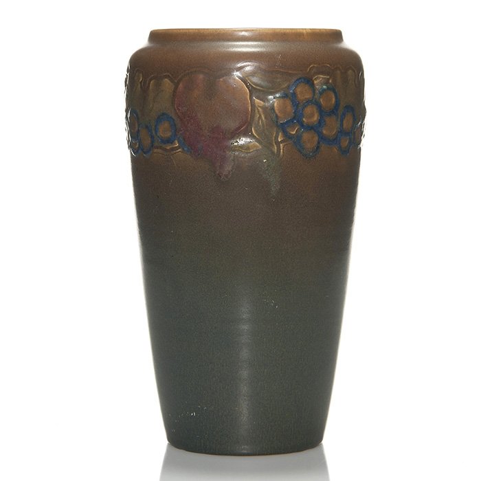 Rookwood carved mat, Todd, 1914, fruit, 11 1/4”: Tall Carved Mat vase with a repeating band of fruit at the shoulder, the work of Charles Todd in 1914. Marked on the bottom with the Rookwood logo, date, shape 1339 C and Mr. Todd’s incised initials