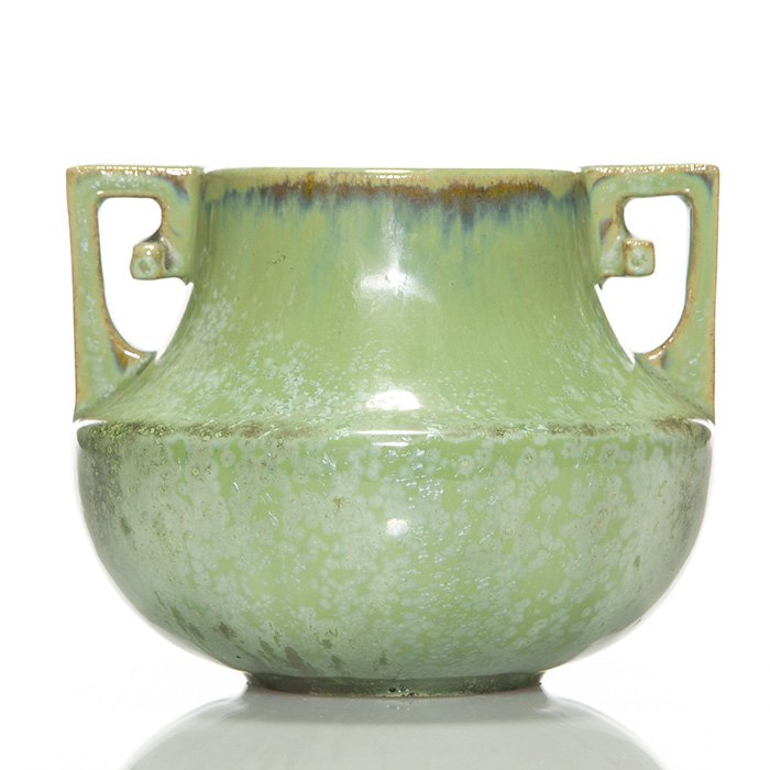 Fulper square handle vase, crystalline glaze, 5”: Fulper Pottery twin handled vase covered in the Cucumber Crystalline glaze. Marked on the bottom with the rectangular “Fulper” ink stamp. There is a tight 2 inch horizontal line at the shoulder an