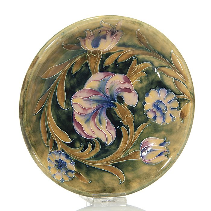 Moorcroft Spanish design plate, 8 1/2” diameter: Early Moorcroft plate in Spanish design. Marked only with painted William Moorcroft signature in green and impressed number 752. Diameter is 8 1/2 inches. Excellent original condition.