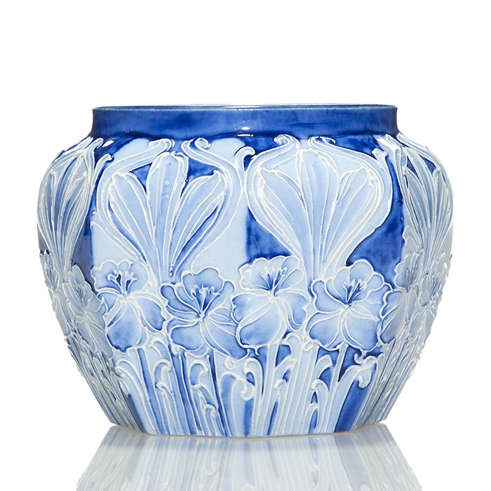 Macintyre Moorcroft Florian freesia bowl, 3 1/2” x 5”: Moorcroft Macintyre Florian Fressia eight sided bowl glazed in blue and white. Measures 3 1/2 inches by 5 inches across. Red Florian Ware backstamp and the green painted initials for William Moorcroft