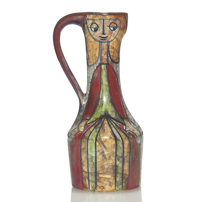 Michael Andersen pitcher, women, Starck, 11 1/2”: Unusual Michael Andersen pitcher done with the Persia Technique and featuring design work by Marianne Starck. Pictured are two women with long blond hair done in a slightly lustrous glaze which looks