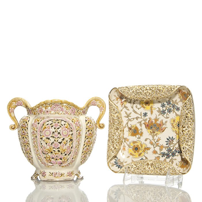 2 Zsolnay items: Vase, 7” and square bowl, 7 1/4: Two early Zsolnay items: 1. Vase with reticulated body and rim. Impressed Zsolnay Pecs 2357. Height 7 1/4 inches. Restoration to one handle. 2. Square bowl with nice floral painting inside and reticul