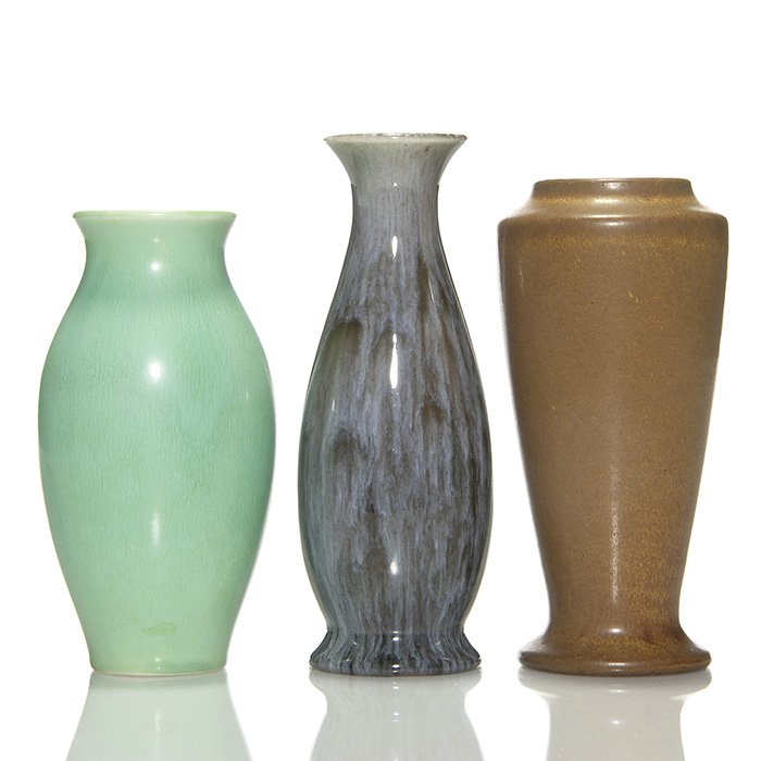 3 Rookwood vases, 2 mat 1 high glaze,tallest 6 1/4”: Three Rookwood vases. 1) 1924 5 3/8 inch shape 356F covered in a light green mat glaze. Excellent original condition. 2) 1911 5 3/4 inch shape 1356F covered in the Ombroso glaze. There is a 1 inch lin