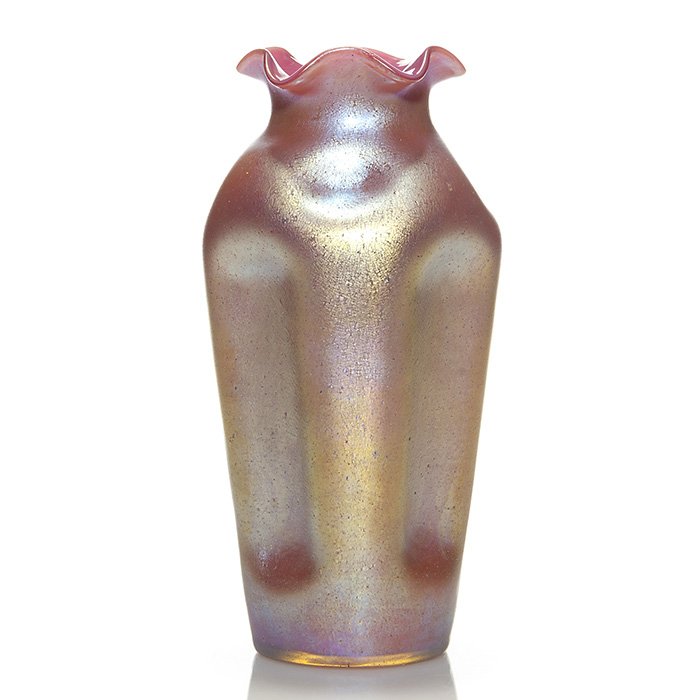 Kralik pink cased vase, ruffled rim, 10 1/8”: Nice Kralik multi dimpled vase displaying a pink gold Loetz-like exterior and a ruffled rim revealing a pink cased interior. Height 10 1/8 inches. Later signed “Loetz Austria” beneath. Excellent b