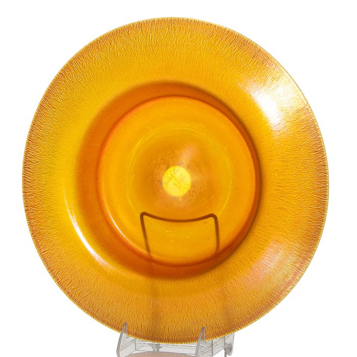 Durand center bowl, 2603, marigold, 2”X14 1/2”, sig: Monumental Durand center bowl exhibiting a bright golden red finish. Measures 2 inches by 14 1/2 inches. Signed “Durand” in silver on the back along with the shape number 2603. The back is equally