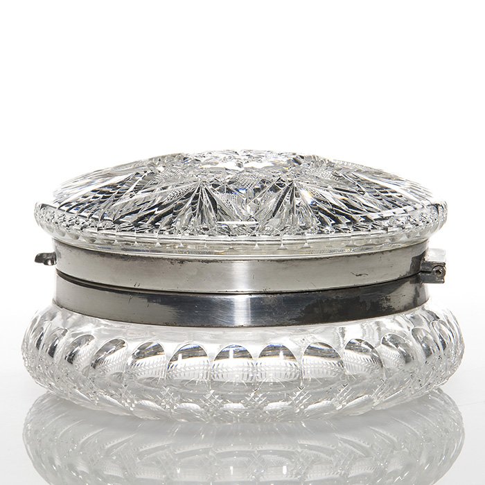 Cut glass powder box, hobstar, 3”X6”: Cut glass powder box, displaying a large hobstar with fans on the cover and both lid and base edged by thumbprint beading and a 32 point star cut into the bottom. Measures 3 inches by 6 inches. Functi