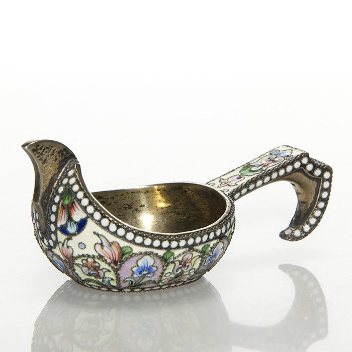 Russian enamel kovsh salt cellar, 1 1/2” X 3 1/2”: Russian enamel kovsh salt cellar displaying pastel cathedral windows with shaded floral displays and a nice beaded trim. Measures 1 1/2 inches X 3 1/2 inches. Gold washed. Impressed with the right fac