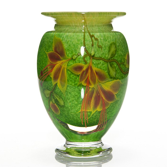 Manual Ward seven layered glass vase, 9”: In 2011, Manuel Ward created this seven layered floral vase. The striking mottled vibrant green ground is a great contrast for the multi colored floral arrangement. Signed and dated along with invento