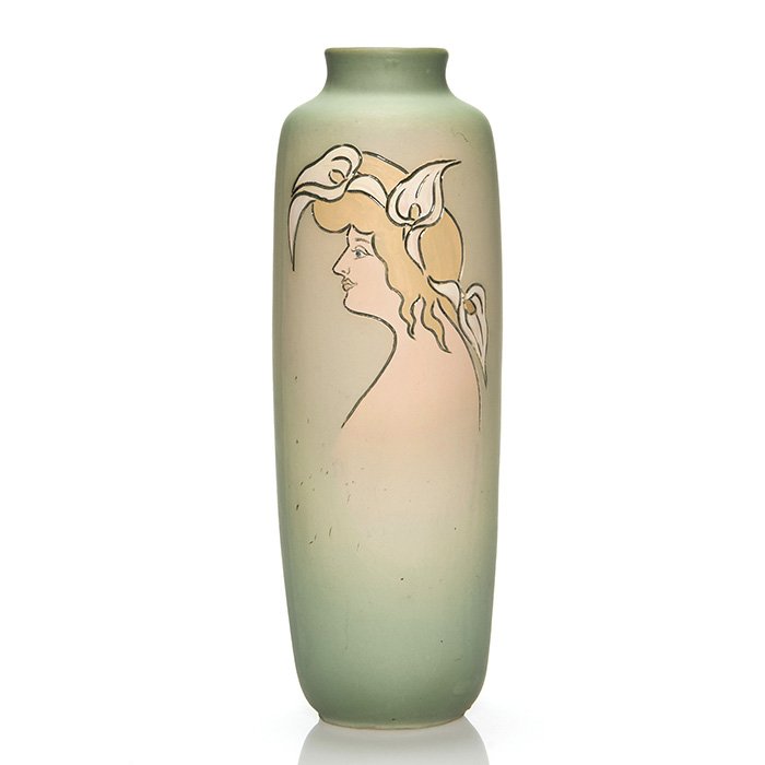 Weller Etched Matt vase, woman's profile, 14 3/8": Tall Weller Etched Matt vase with the profile of a blue eyed woman with flowing blonde hair. Incised Weller Etched Mat on the bottom. There are some tiny dark speckles in the glaze similar to pepperin