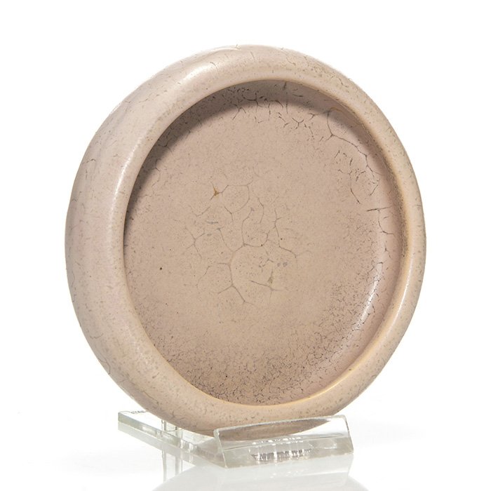Teco low bowl in taupe glaze, 1" x 4 1/4": Teco low bowl covered in a taupe mat glaze. Impressed with the Teco logo on the bottom. Size is 1 inch high by 4 1/4 inches in diameter. There is some curdling in the glaze due to it being applied a b