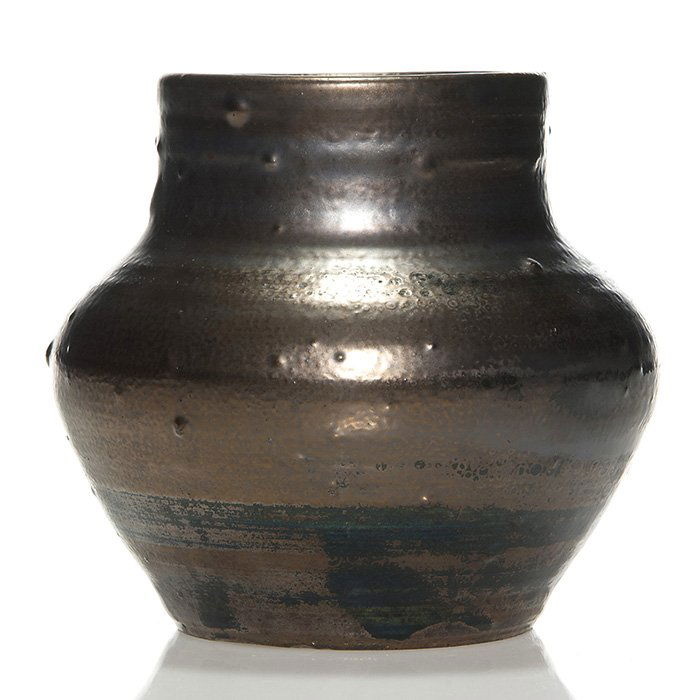Scheier Hillcrock Pottery black metallic vase: Hillcrock Pottery vase crafted by Edwin and Mary Scheier circa 1938-39, featuring coppery metallic over black glazes. Impressed with the Hillcrock Pottery logo. In excellent, original condition. Heigh