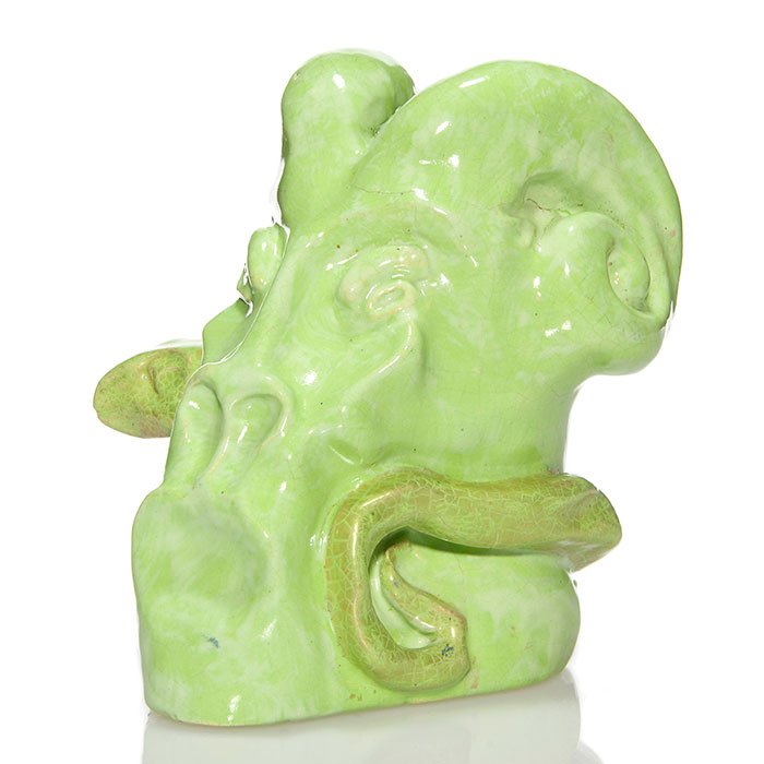 Rene' Buthaud green Satan and Serpent, 7 3/8": Rene' Buthaud sculpture, a head of Satan with a snake coiled around his neck. The head itself is done in a mottled green glaze with some luster while the scales of the snake are done in another, sligh