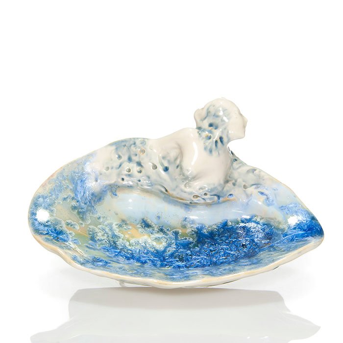 Mougin tray with nude, crystalline glaze, 3 1/2": Good Mougin shell tray, a beguiling nude Siren rising from the ocean waves and covered with an nice ocean blue crystalline glaze. Measures 3 1/2 inches by 7 3/8 inches wide. Impressed Mougin Nancy, 94