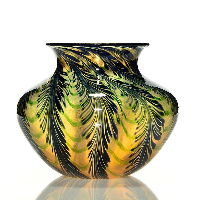 C. Lotton, Sunset vase, ferns, rainbow, 7 1/2", 2005: Sizable Sunset vase created by Charles Lotton in 2005, draped in black ferns and connected by green aventurine swags. A nice subtle rainbow effect of magenta and gold backs the design, appearing to ha