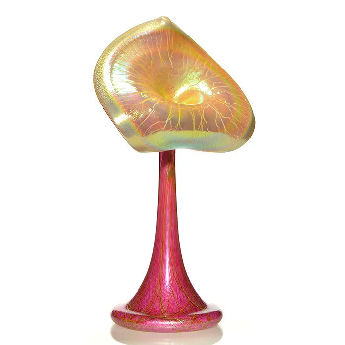 Stuart Abelman Jack-in-the-Pulpit, pink, 16 1/4": Stuart Abelman Jack-in-the-Pulpit, a pretty Fuchsia pink drizzled with golden threads. The 9 1/4 inch pan is cased with a gold aurene face bordered by a rainbow halo, the surface displaying the charac