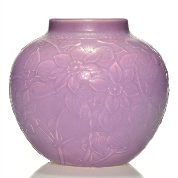 Rookwood purple production vase,1928,2691, 6 3/4": Production 6 3/4 inch vase with a molded floral decoration, cast in 1928 and covered with a soft purple mat glaze. Marks include the Rookwood logo, date and shape 2691. Excellent original condition.