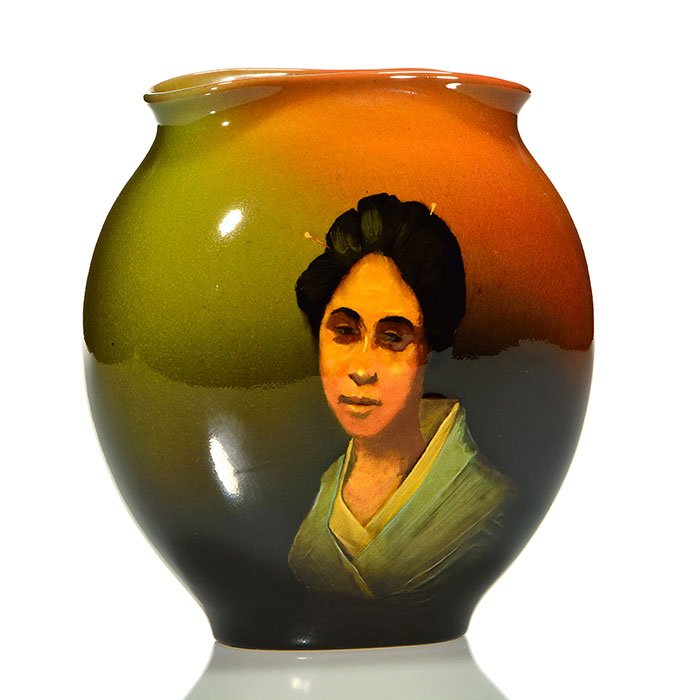 Rookwood Standard vase,Horsfall,Geisha,'94,5 7/8": Sensitive portrait of a Geisha done on a pillow vase by Bruce Horsfall in 1894. Marks include the Rookwood logo, which indicates the date, shape 707 B, an impressed W for White clay and the incised mo