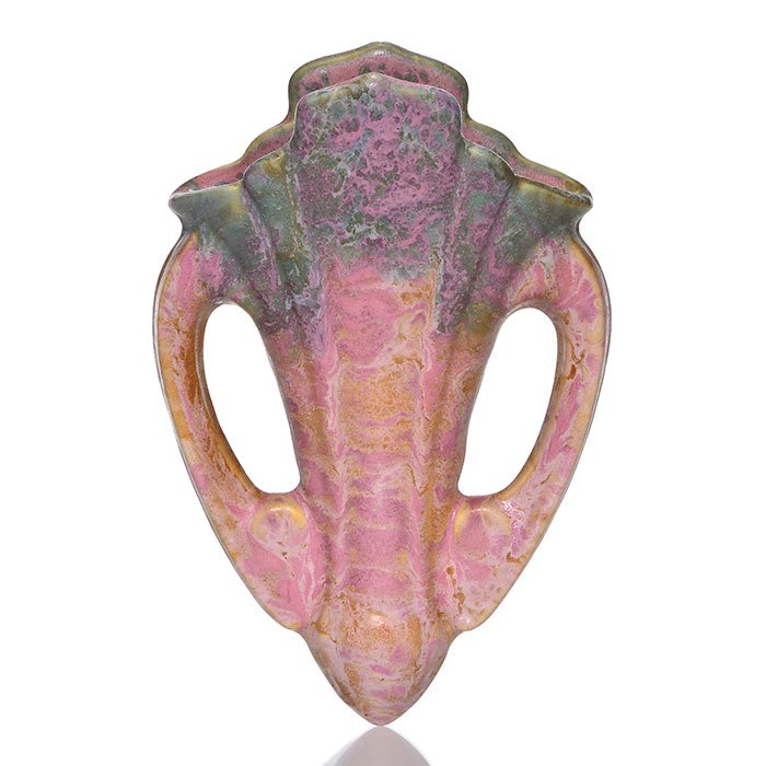 Roseville Carnelian ll wall pocket, 8 1/4", 1252: Roseville Carnelian ll wall pocket, shape 1252 in pink and green. Height 8 1/4 inches. Shape mark in red crayon and The Maylo retail sticker on the back. Factory glaze grind to upper back corner. Exce