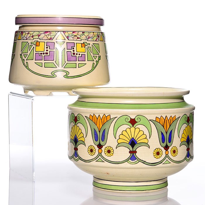 Roseville Creamware Persian jardiniere, 2, 9 1/4": Two Roseville Creamware (Persian) Jardinieres with floral decoration. 1) Size 9 1/4 inches tall by 12 inches in diameter. Marked on the bottom Roseville and 557. 2) Size 7 inches high by 10 inches in