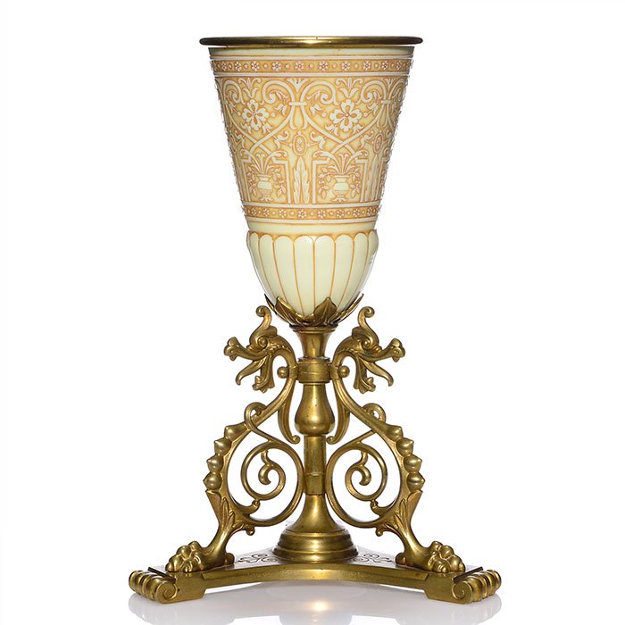 Thomas Webb Cameo urn, metal base, 15 1/2": Thomas Webb & Sons Ivory cameo urn mounted within an ornate brass base with three unusual fire breathing Dragons and having a fixed brass insert. The glass body is fastidiously carved with a flawless