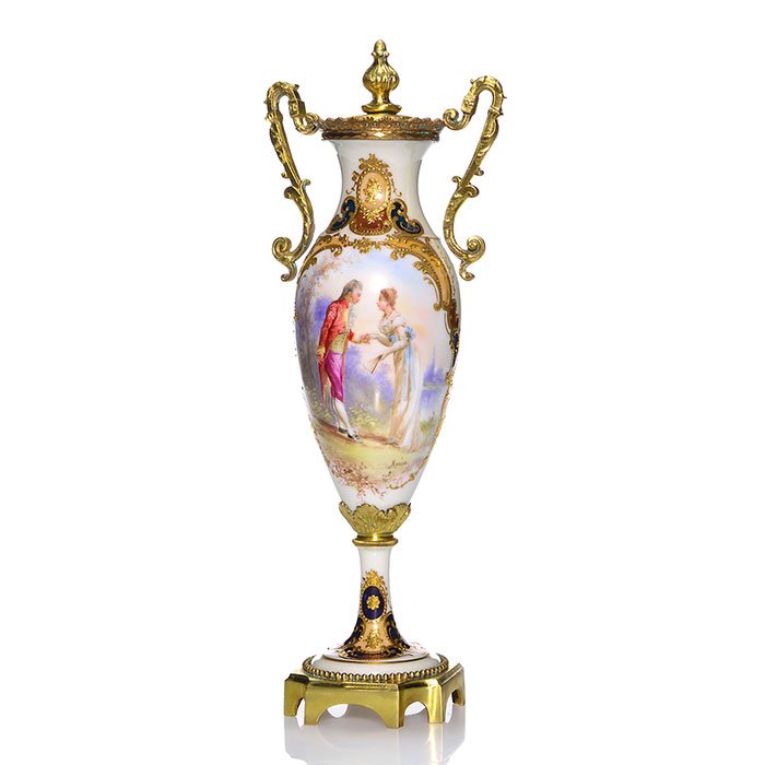 Sevres-style porcelain bolted urn, Lady & Gent, 13": Sevres-style porcelain bolted urn featuring a Victorian Lady & Gent in a garden on the front and a country scene on the back, signed by artist Marin, possibly Alice Mille Marin. Several colors of lust
