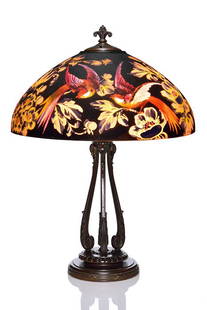 Handel lamp, Birds of Paradise, black, Bedigie, 7026: Good Handel "Birds of Paradise" lamp, design 7026 by Henry Bedigie. The 18 inch reverse painted shade features a pair of colorful exotic birds on either side frolicking among large poppies and anemone