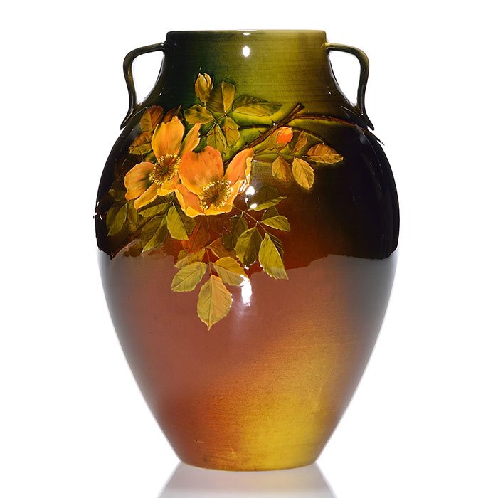 Rookwood Standard vase, Daly, 1891, 604 C, 9 1/8": Standard glaze handled vase decorated with yellow roses done by Matt Daly in 1891. Marks include the Rookwood logo, which indicates the date, shape 604 C and Mr. Daly's monogram. There is faint, scatt