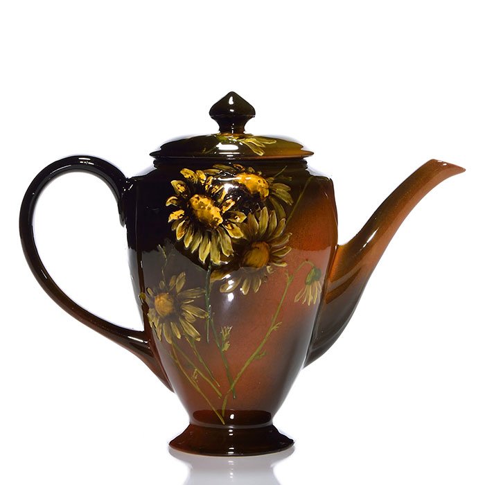 Rookwood Standard coffee pot, Zettel,1893, 555, 7": Standard glaze lidded coffee pot decorated with daisies, the work of Josephine Zettel in 1893. Marks include the Rookwood logo, which indicates the date, shape 555, an impressed W for White clay and M