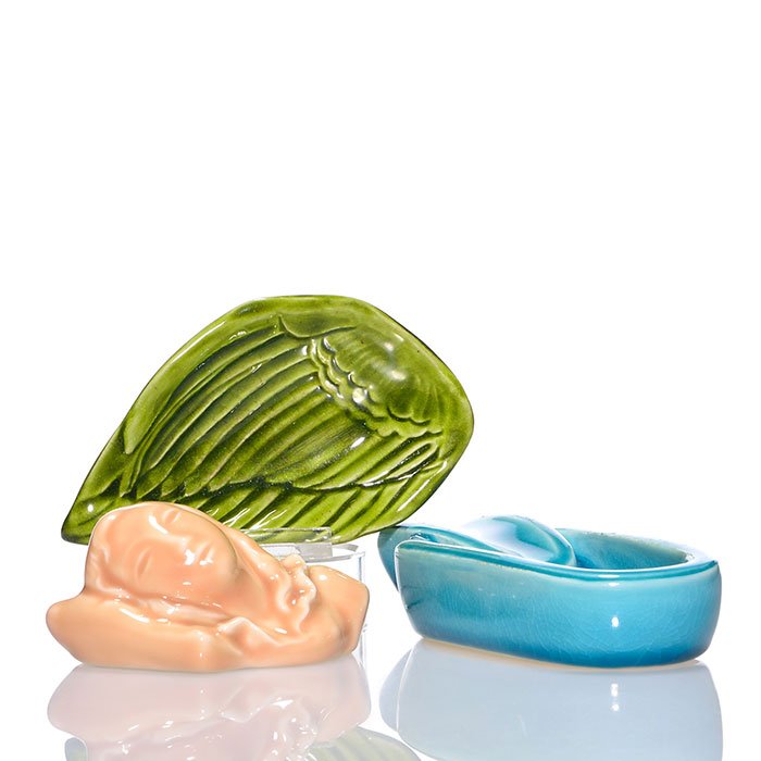 3 Kenton Hills items, shapes 172, 157, 92: 3 Kenton Hills items. 1) Suzanne paperweight, shape 157, in pink. Size is 1 7/8 inches high by 4 1/4 inches long. Uncrazed. 2) Wing tray, shape 172, in Brazilian Cats Eye. Size is 3/4 inches high by 5
