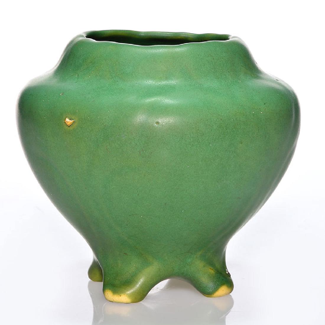 Radford Radura Mat Green 4 footed vase, 5 inches,: Albert Radford Radura four footed mat green vase molded with scrolled panels under a thick glaze. Height 5 inches. Impressed Radura 16. Tiny clay particle on shoulder, glazed chip inside rim, thin gla