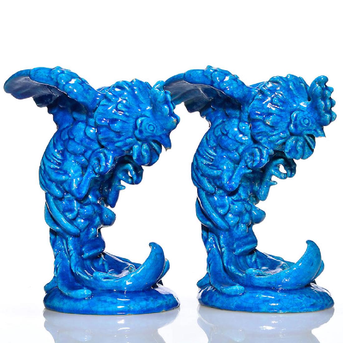 Pair of Lachenal rooster flower holders, 11 inches: Pair of Edmond Lachenal rooster figurines, probably used as flower holders done in rich blue. Both are marked Lachenal and France in black slip on the underside. Height of each is 11 inches. Glaze chi