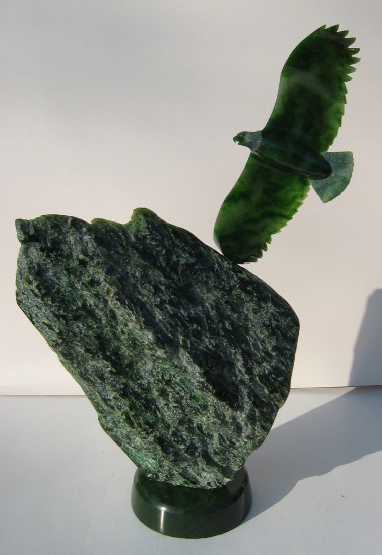 Bald eagle: LYLE SOPEL (Canadian 1951 - ) Bald eagle Jade sculpture 19" x 12" x 6" (48.26 x 30.48 x 15.24cm.) Signed on base & inscribed E151