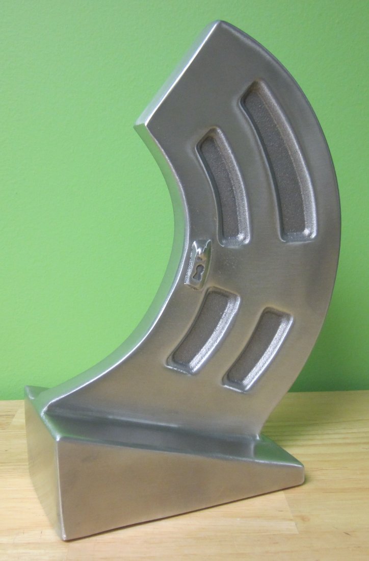 Door: JOHN MACGREGOR (Canadian 1944 - ) Door Cast aluminum sculpture 9.25" x 6.5" x 3" (23.5 x 16.5 x 7.6cm.) Signed & numbered 4/75