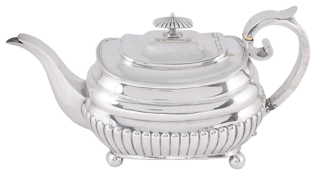 ˜A GEORGE III SILVER TEAPOT SAMUEL WHEATLEY & JOHN: ˜A GEORGE III SILVER TEAPOT SAMUEL WHEATLEY & JOHN EVANS LONDON 1811 oblong the part-lobed ridged body with a gadroon rim on ball feet the lid with oblong lobed finial silver simple scroll handle 30c