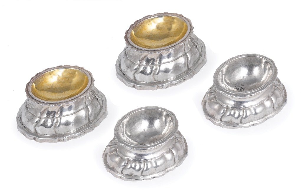 TWO PAIRS OF GERMAN SILVER SALT CELLARS, 18TH CENTURY: TWO PAIRS OF GERMAN SILVER SALT CELLARS, 18TH CENTURY shaped oval, fluted 9.5 and 8cm long, 244gr (7oz)
